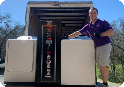 Double Move mover standing near a fully loaded moving truck during a professional relocation service in Sacramento