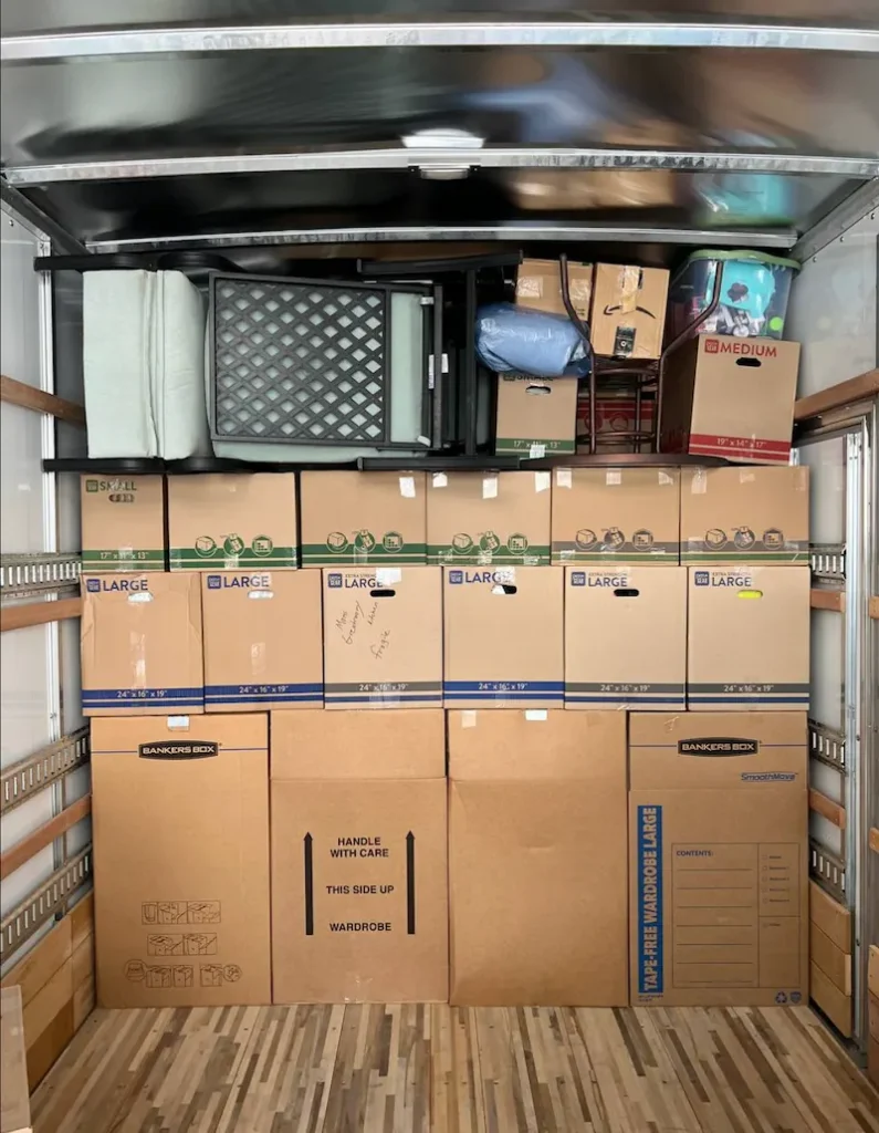 Packed items and boxes in the Double Move moving van
