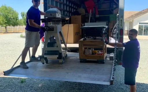 Double Move mover protecting the floor and door frame with pads and runners before moving furniture
