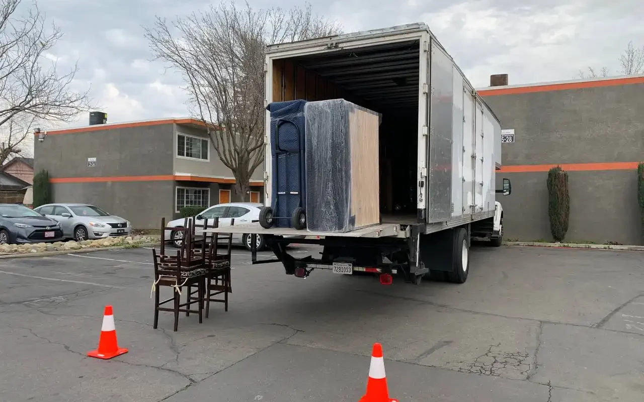 carmichael movers truck in action
